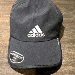 Black never used adidas hat with tags still on it